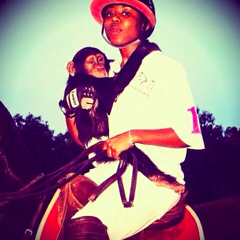 Neku Atawodi with monkey